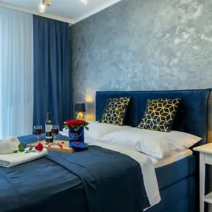 https://exclusive-gold-apartment.krakowhotelspoland.com